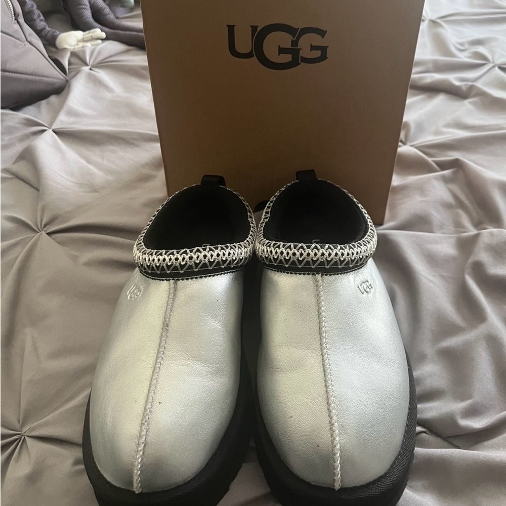 UGG Metallic Silver Slip-Ons with Black Trim